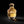 A bottle of Califah Patchouli Leather Parfum with a faceted gold cap and a clear glass body showing golden liquid, set against a solid black background.